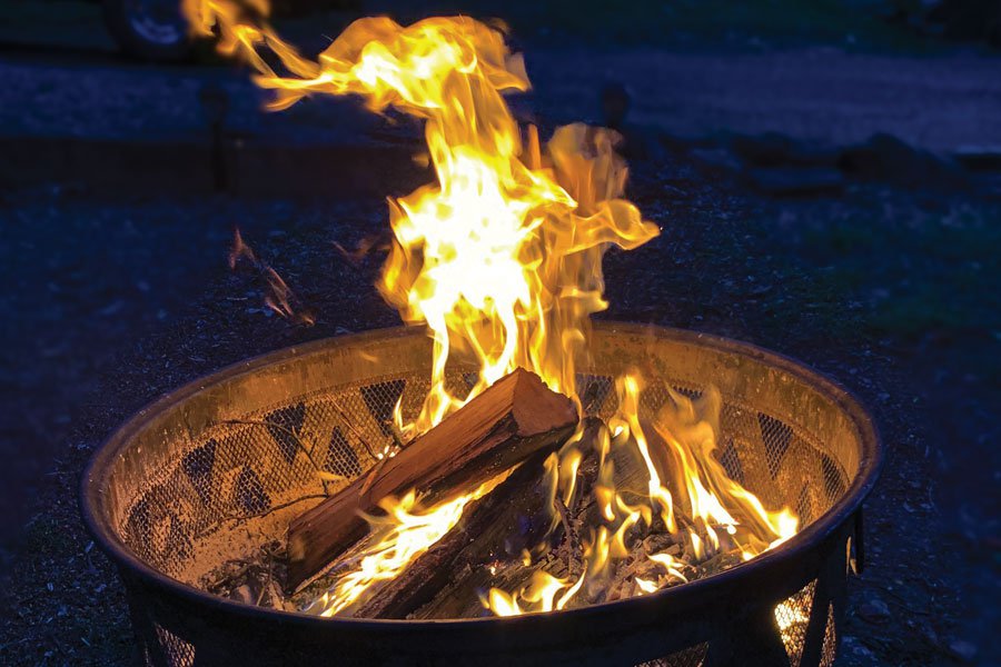 Outdoor fire pit burning seasoned hardwood
